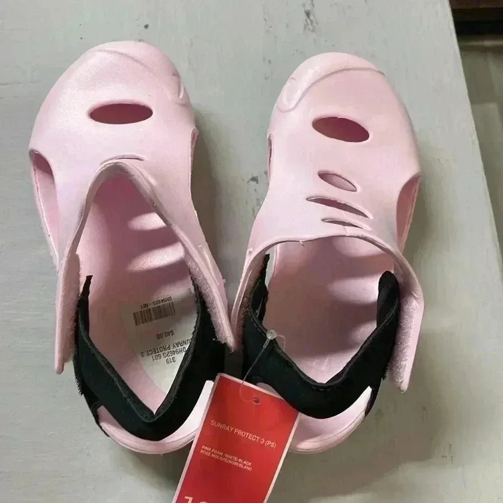 Girls pink Nike shoes